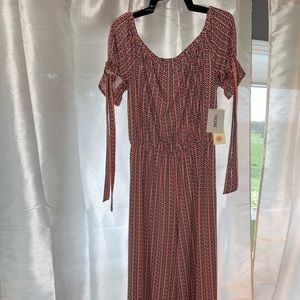 Brand new with tags orange and black jumpsuit!